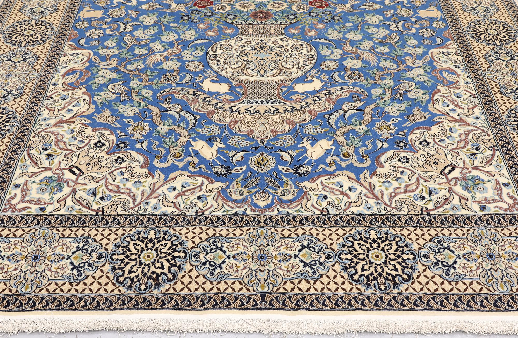 A Figural Nain-Isfahan carpet, part silk, 318 x 213 cm.