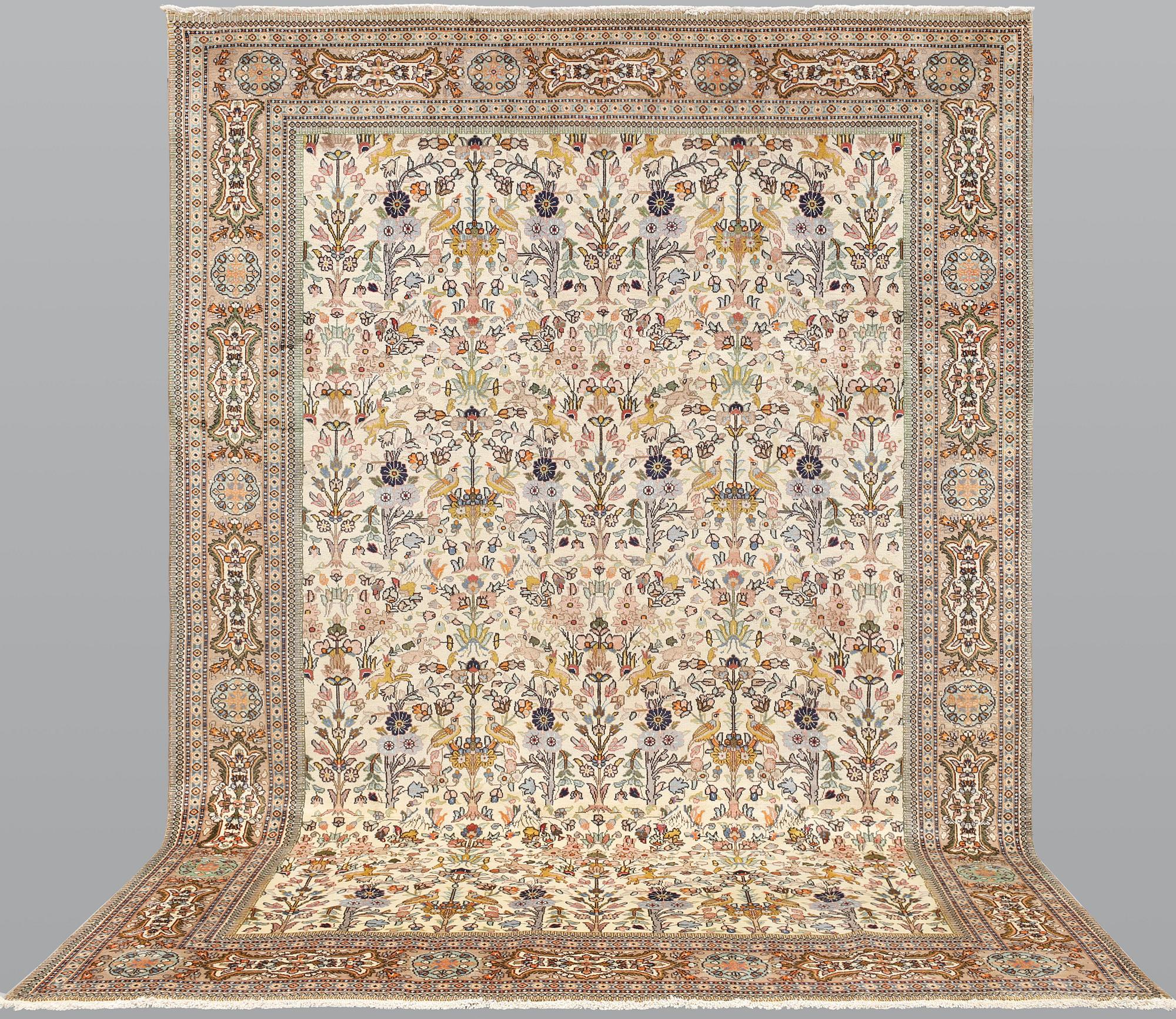 A Täbriz Tabatabai carpet, c.  352 x 240 cm.