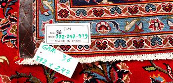 A Keshan carpet, c. 372 x 247 cm.