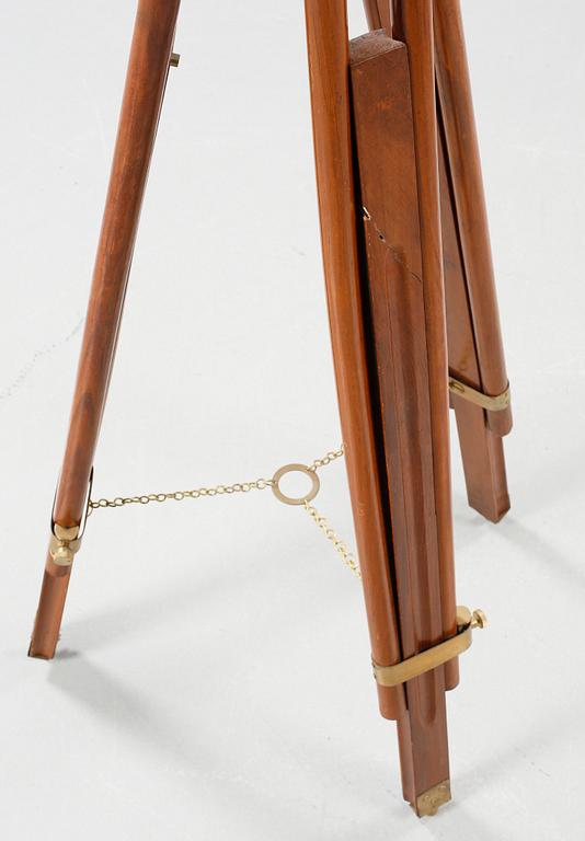 A spotting scope with a wooden stand, second half of the 20th century.