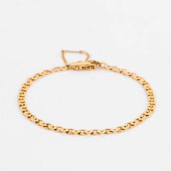 18K gold bracelet.