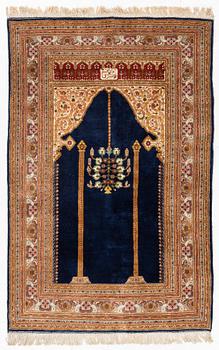 An oriental rug, c. 190 x 125 cm.