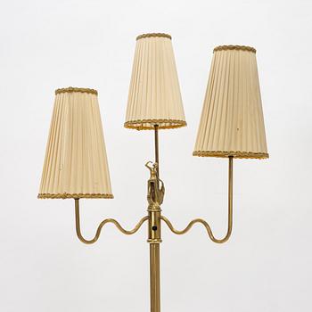 A Swedish Grace brass floor lamp, first part of the 20th Century.