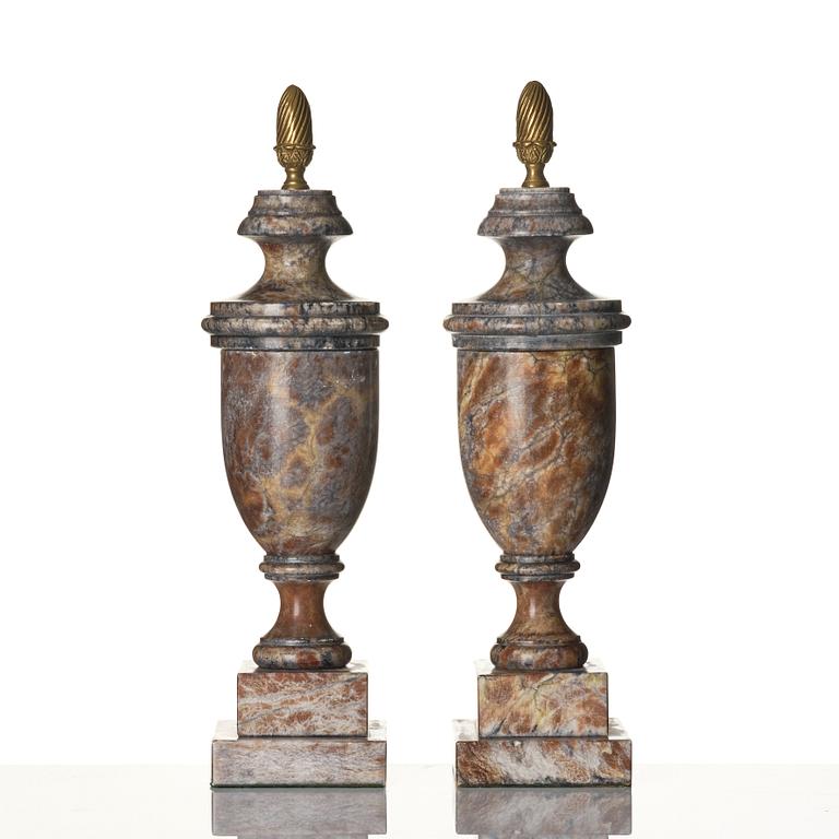 A pair of marble urns, around year 1900.