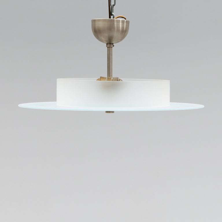 TAKLAMPA, 1900-talets mitt.