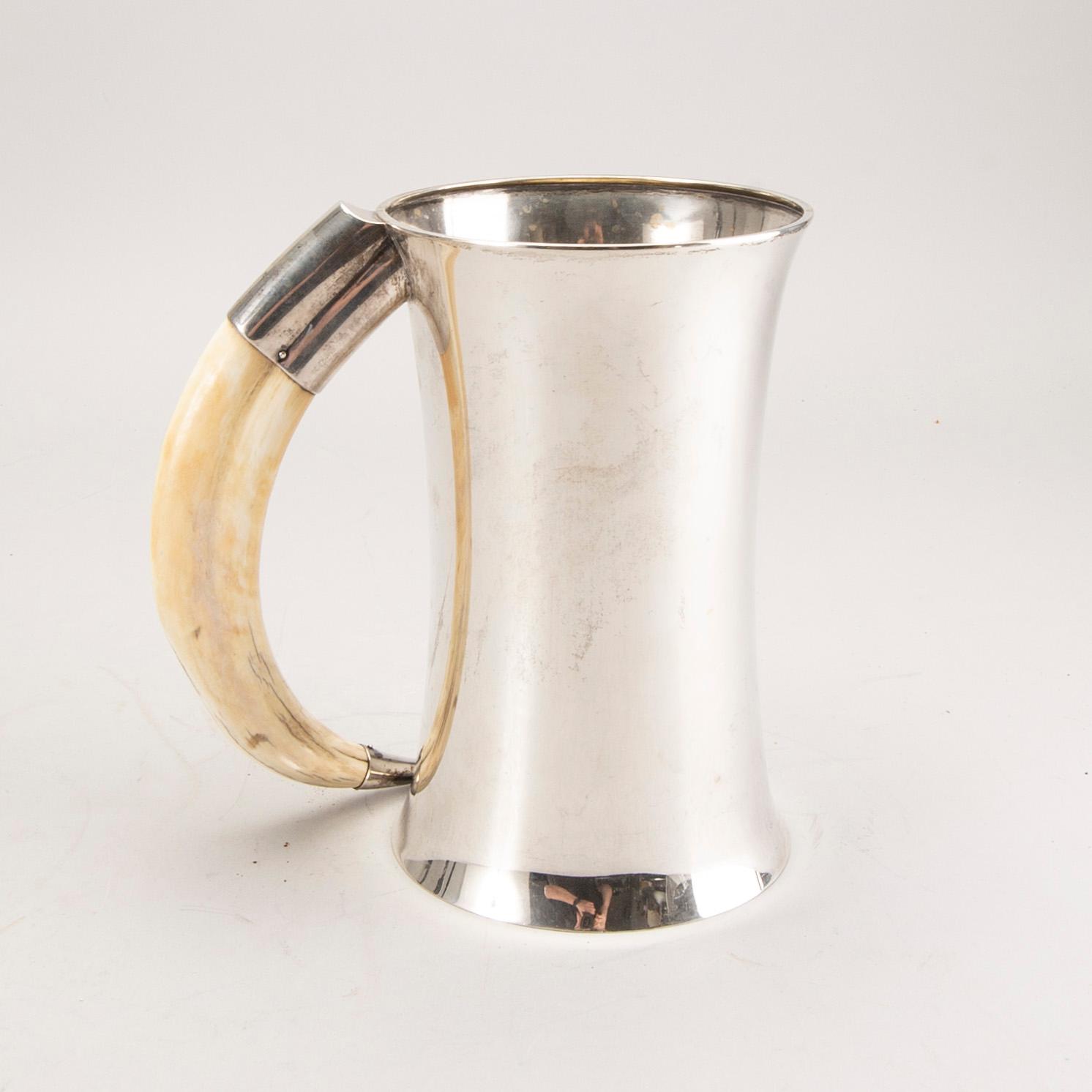 A Swedish 20th century silver and boar tusk tankard mark of CG Hallberg Stockholm 1915 weight 880 gr.