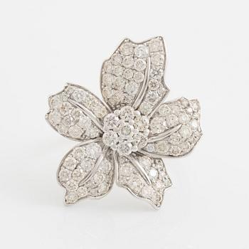 Brilliant cut diamond flower ring.