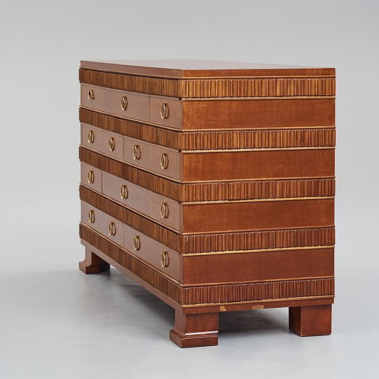 Oscar Nilsson, attributed to, a mahogany chest of drawers, Sweden 1930's.