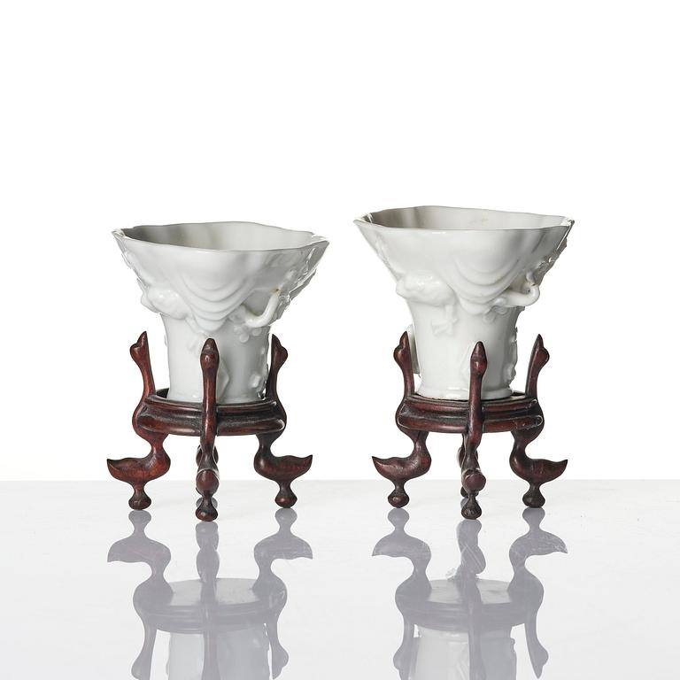 Two blanc de chine rhinoceros libation cups, Qing dynasty, Kangxi (1662-1722).