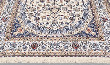 A carpet, Nain Part silk, 312 x 207 cm.