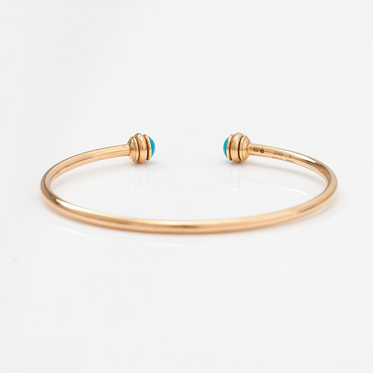 Piaget, A "Possession" bracelet made of 18K gold with turquoises. Marked Piaget R58367, 15.