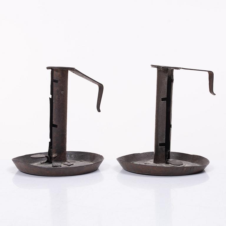 A pair of similar candle holders, 19th century.