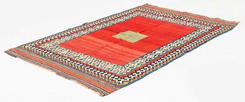 An antique Qashqai kilim rug, approximately 240 x 155 cm.