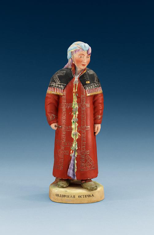 A Russian bisquit figure of a Khanty woman, Gardner (Dimitrovsk Porcelain Manufactory 1929-34),