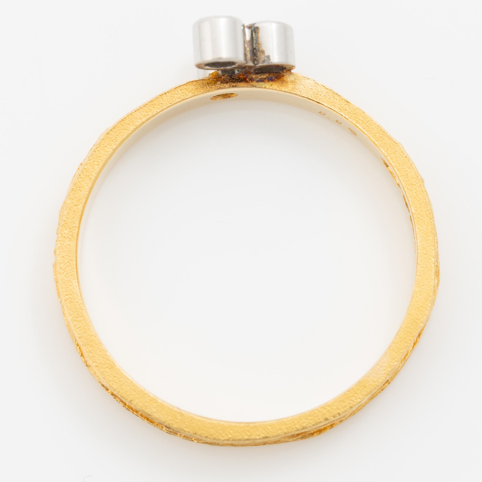 Lapponia, ring, 18K guld med runda briljantslipade diamanter, Finland 1976.