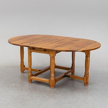 A baroque style gate-leg table, first half of the 20th century.