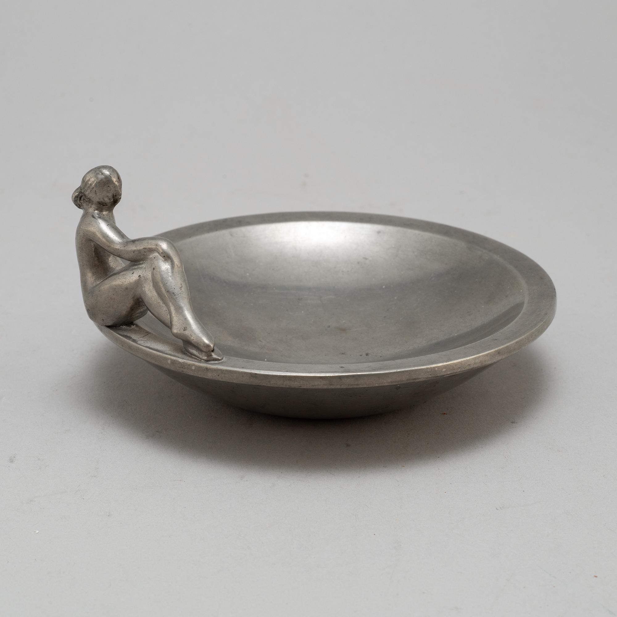 a pewter plate by Firma Svenskt Tenn Stockholm, 1928.