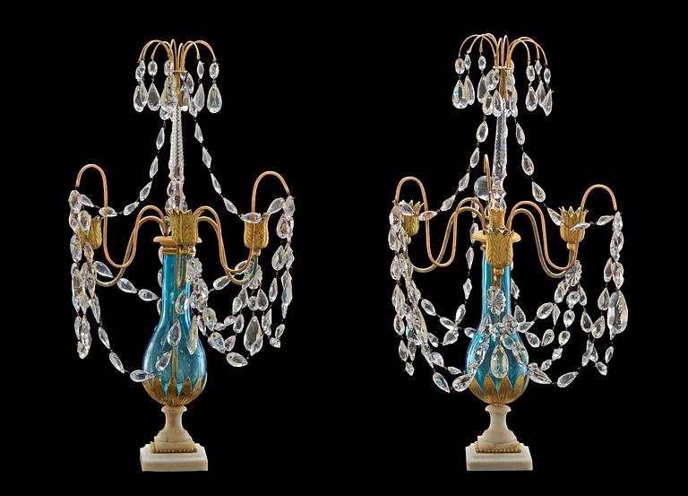A pair of gilt bronze and glass three-light girandoles, Russia late 18th century.
