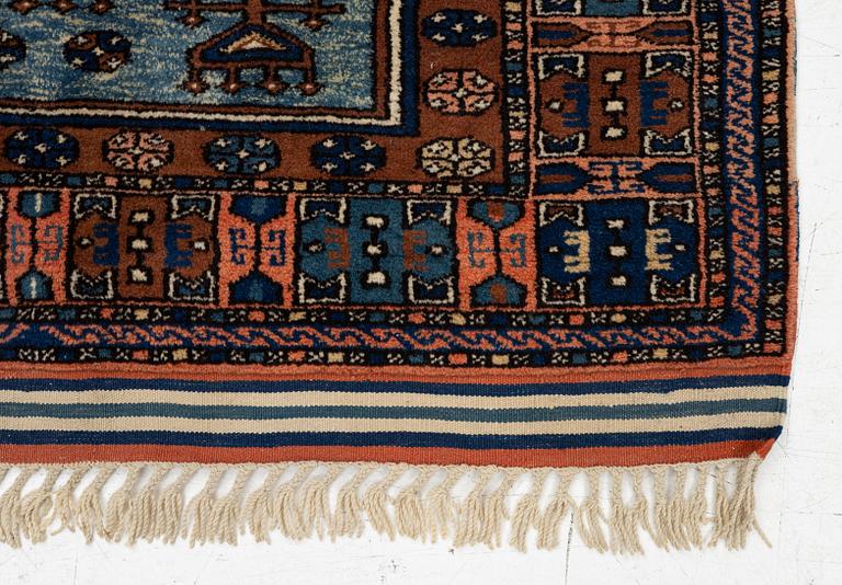 A semi-antique Anatolian rug, c. 127 x 117 cm.