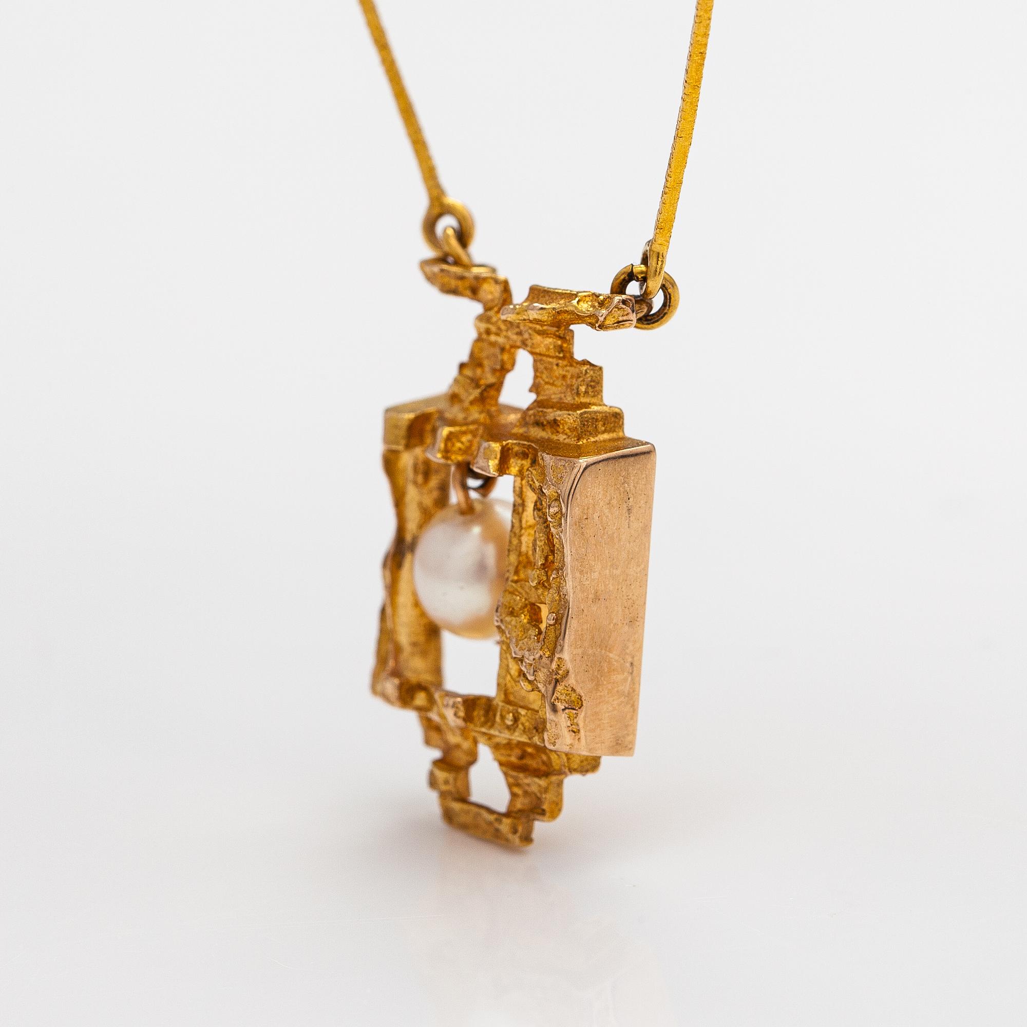 Björn Weckström, "Magic pearl", an 14K gold necklace with a cultured pearl. Lapponia 1972.