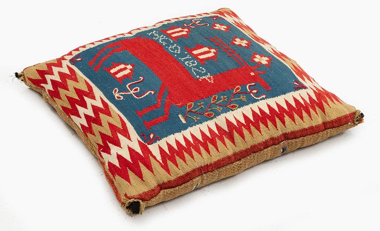 A double-interlocked tapestry cushion, c. 46 x 44 cm, probably Skytts district, signed and dated HGD 1824.