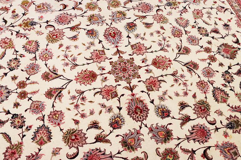 An old Tabriz carpet, part silk, 60 raj, c. 253 x 250 cm.