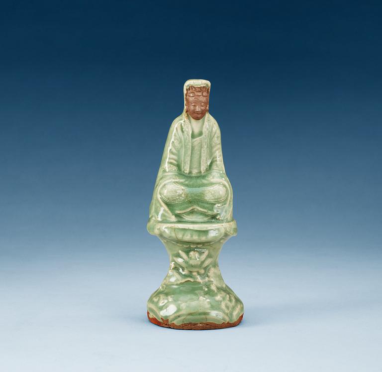 A celadon glazed figure of Guanyin, Ming dynasty.