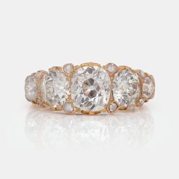 540. A rose- and old- cut diamond ring. Total carat weight circa 4.00 cts.