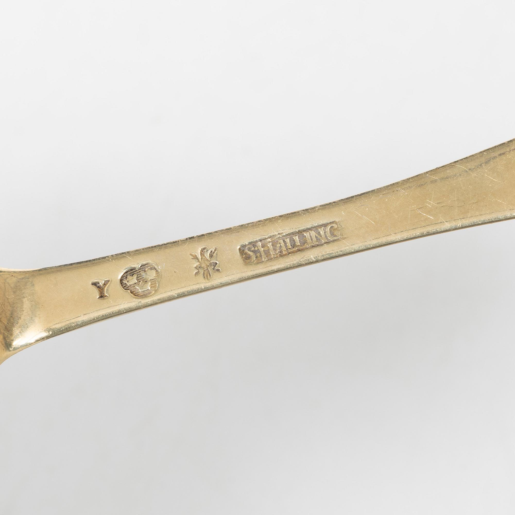 A Swedish silver gilt spoon, and a silver serving spoon, 18-19th Century.