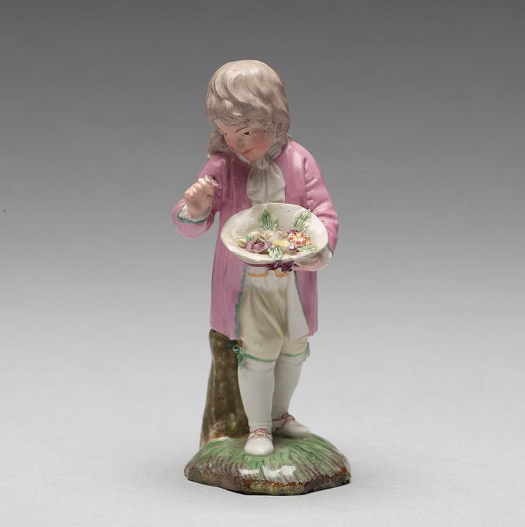 A Höchst porcelain figure of a boy, 1770's.