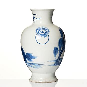 A blue and white bronze shaped vase with mythical creatures, Qing dynasty, 19th Century.