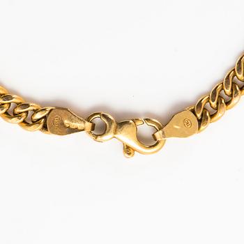 A set of 14K gold necklace and bracelet.