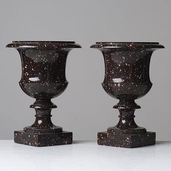 A pair if Swedish porphyry urns, early 19th century.