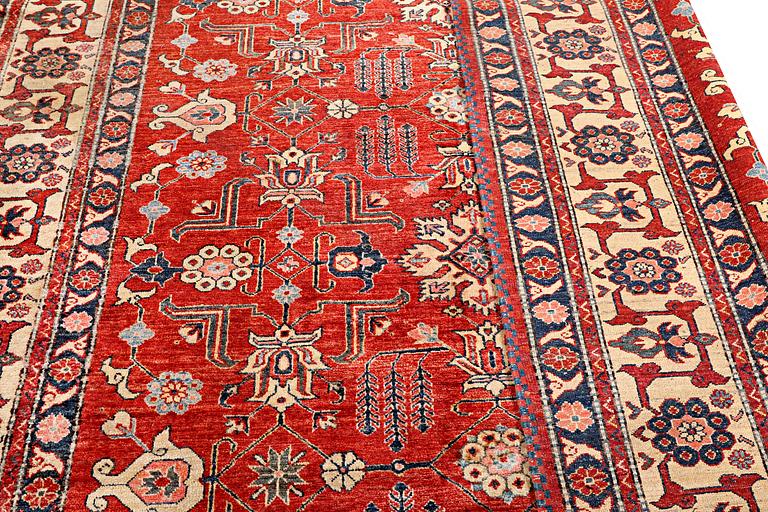 A Kazak carpet, c. 325 x 240 cm.