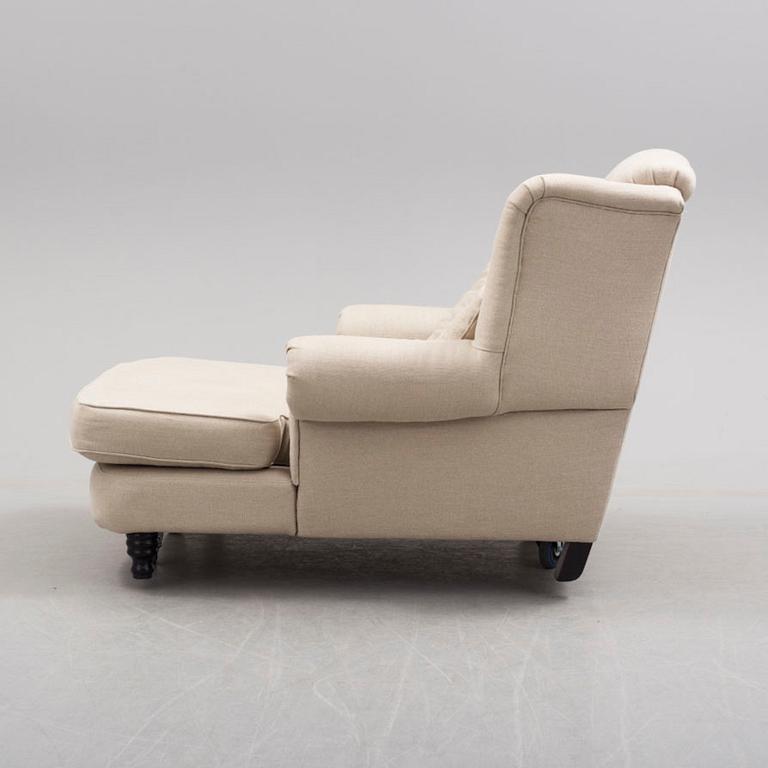 A 'Howard' wing-chair, 21st Century-.