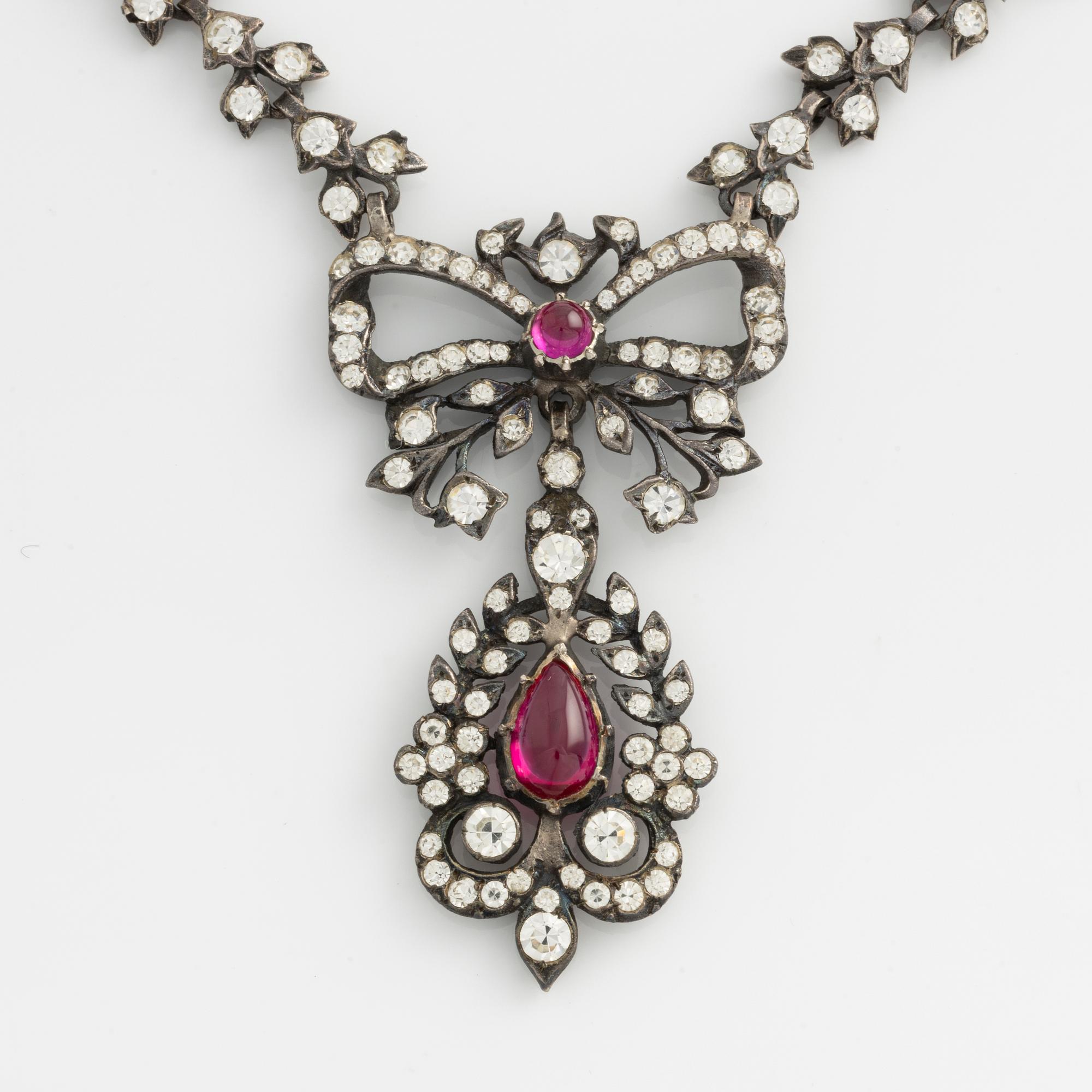 Set of necklace and earrings, silver and paste.