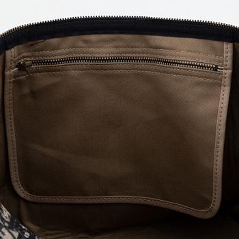 Christian Dior, weekendväska med paraply.