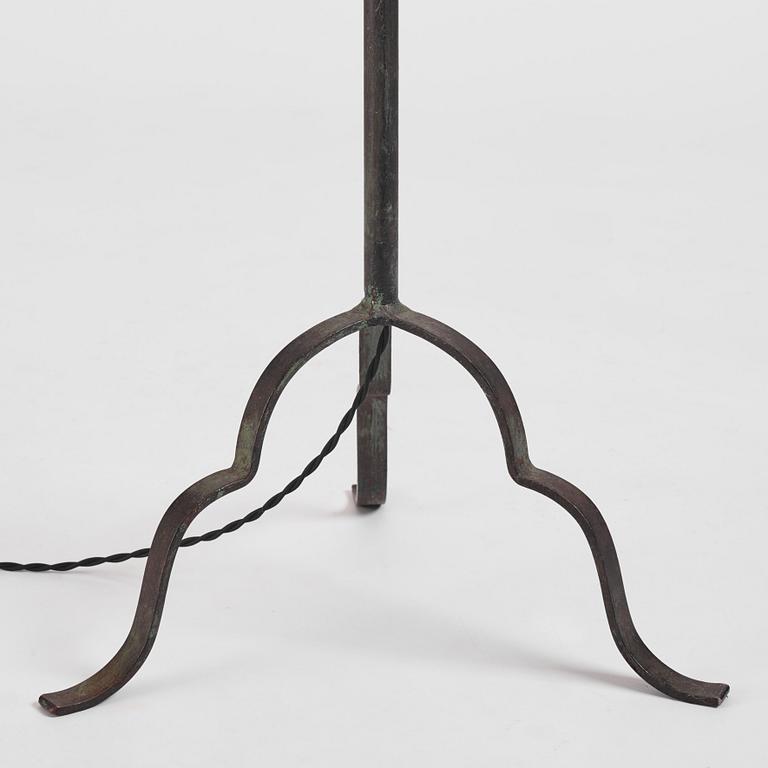 Harald Notini, a pair of wrought iron floor lamps, model "15101", Arvid Böhlmarks Lampfabrik, 1930s.