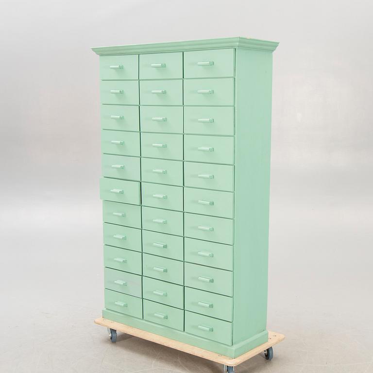 A painted 1940/50s filing cabinet.