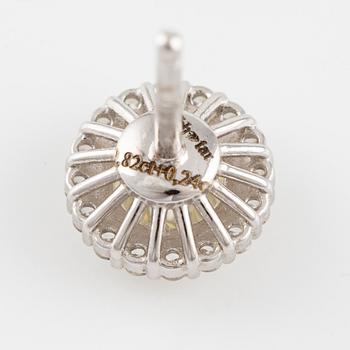 A pair of earrings in 18K white gold with round brilliant-cut diamonds.
