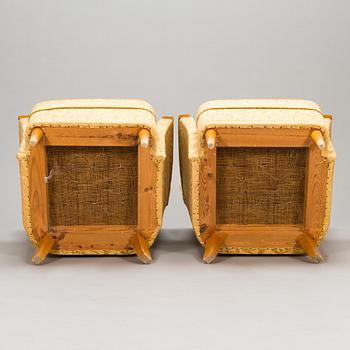 A pair of 1950's armchairs.