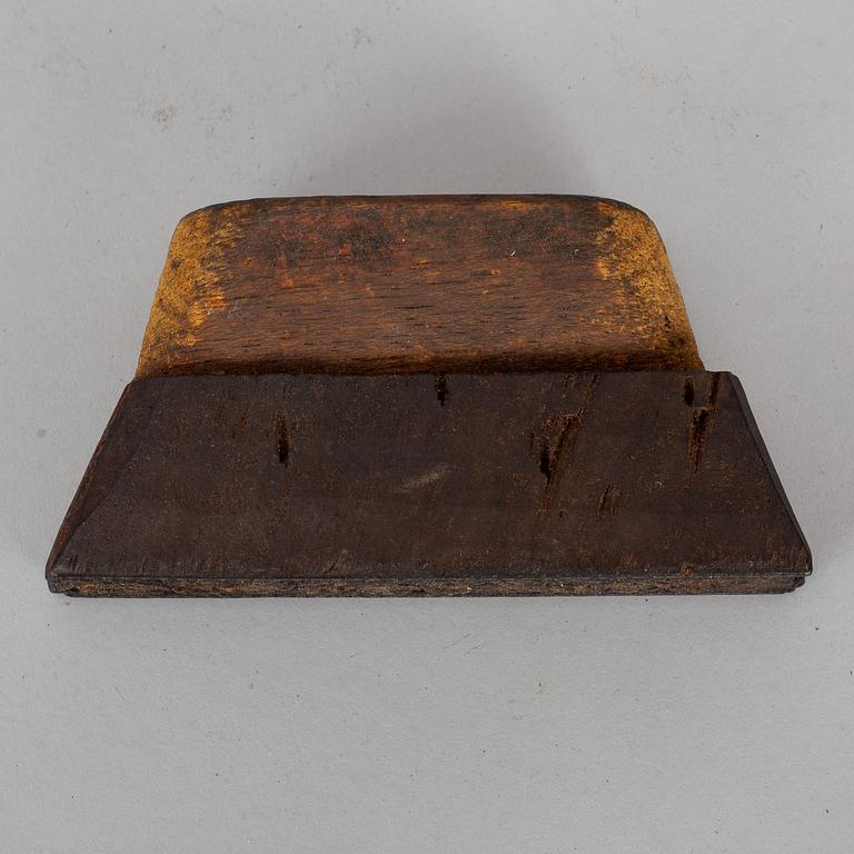 An 18th century wall paper stamp.