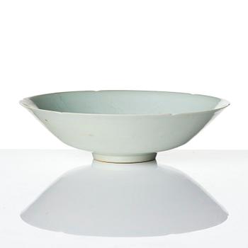 A carved qingbai foliate bowl, Song dynasty (960-1279).