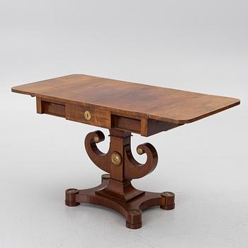 An Empire table, first half of the 19th century.