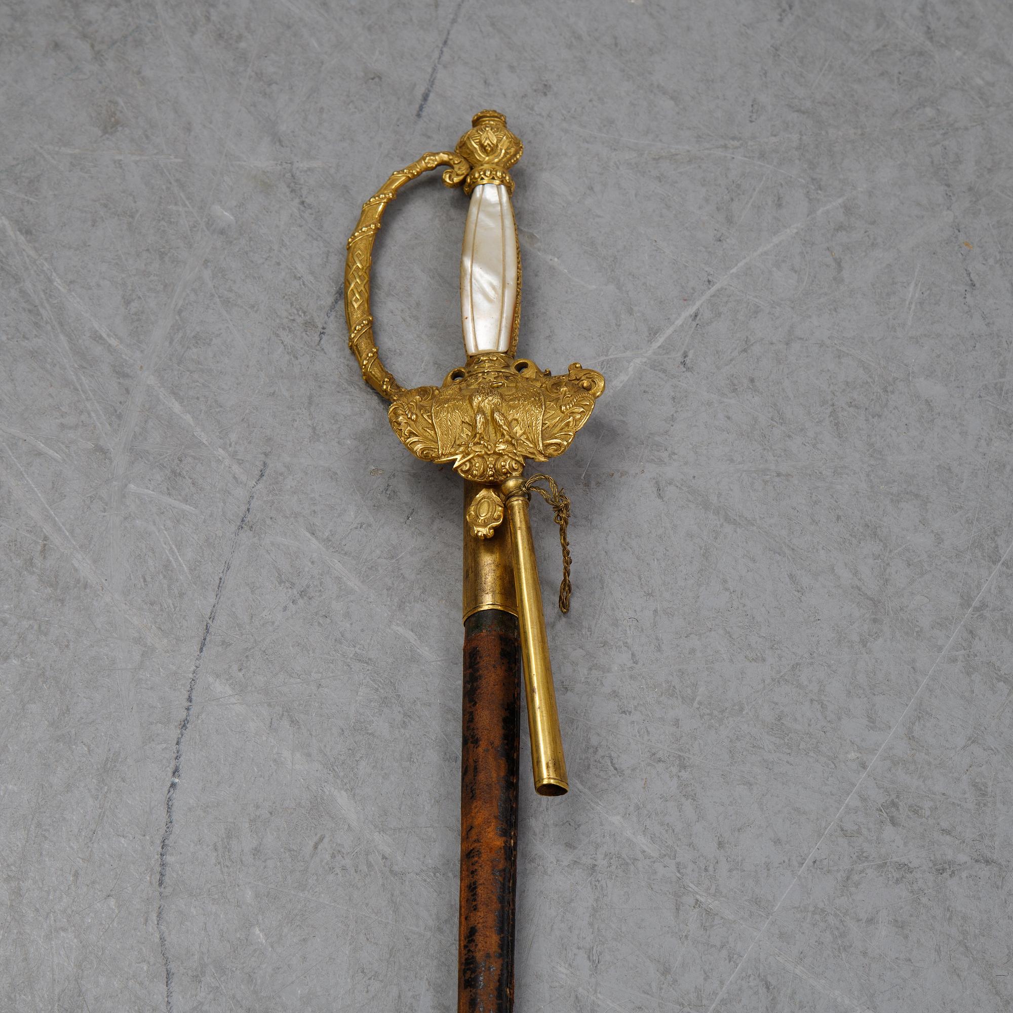 A french small sword with scabbard, early 19th Century.