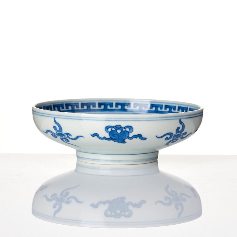 A blue and white heavily potted dish, Republic period with a mark.