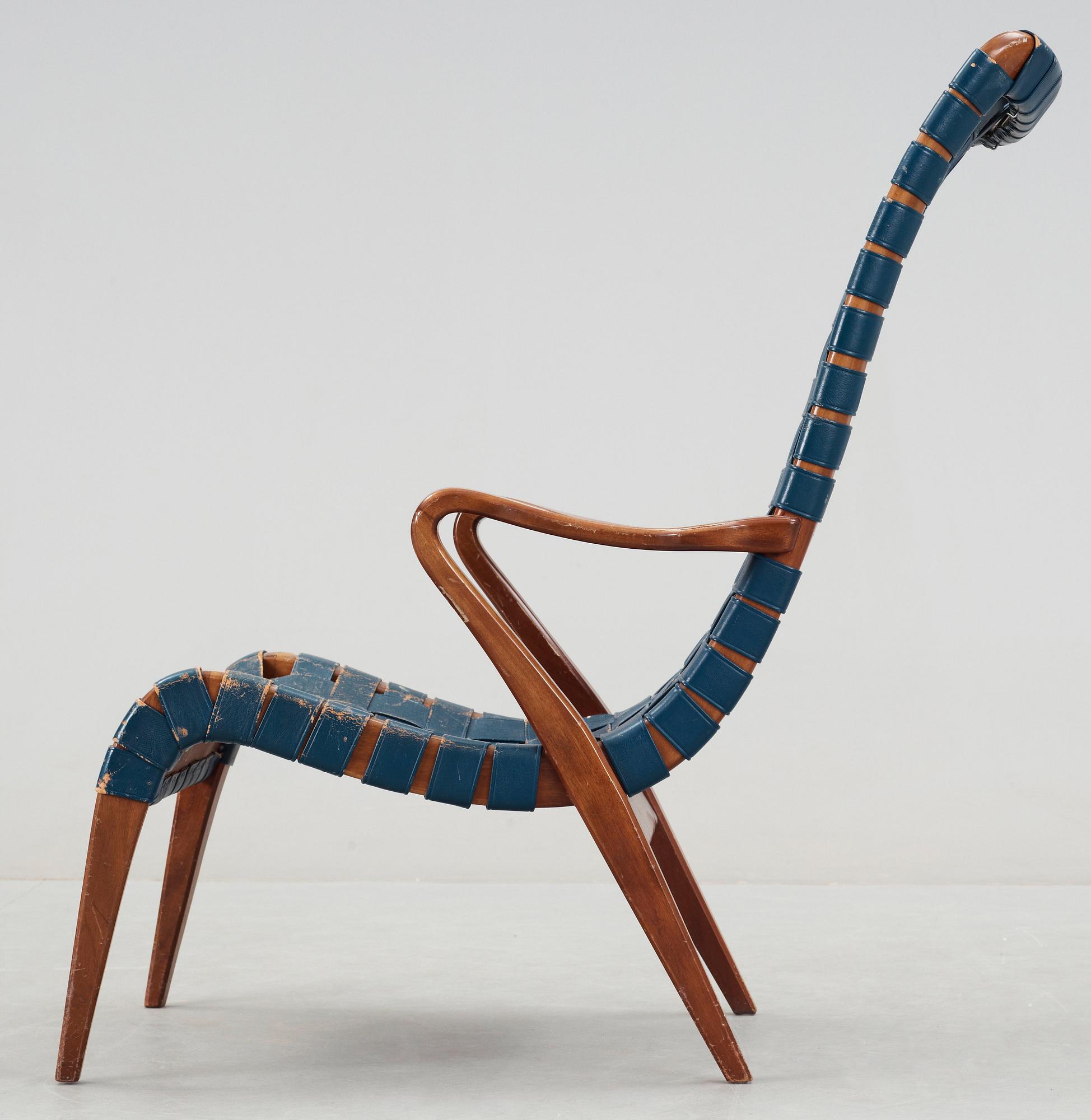 An Axel Larsson mahogany and leather armchair, Bodafors, 1940's.