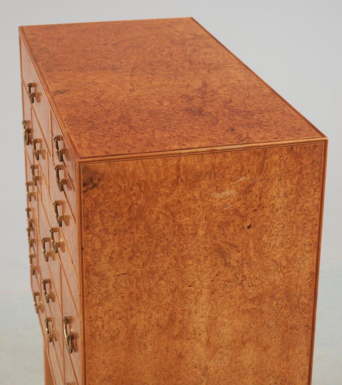 A Josef Frank burrwood, mahogany and walnut cabinet, Svenskt Tenn, model 881.