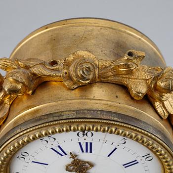 A French gilt bronze mantel clock from Henry Marc á Paris, second half of the 19th century.