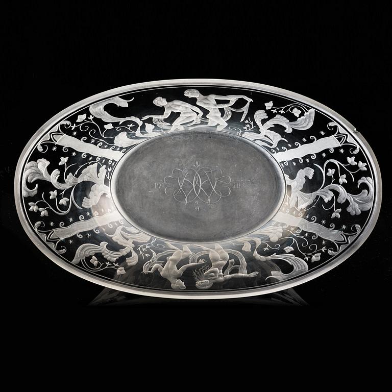 Simon Gate, a Swedish Grace engraved glass bowl with stand, Orrefors 1930, model 147, engraved by Karl Rössler.